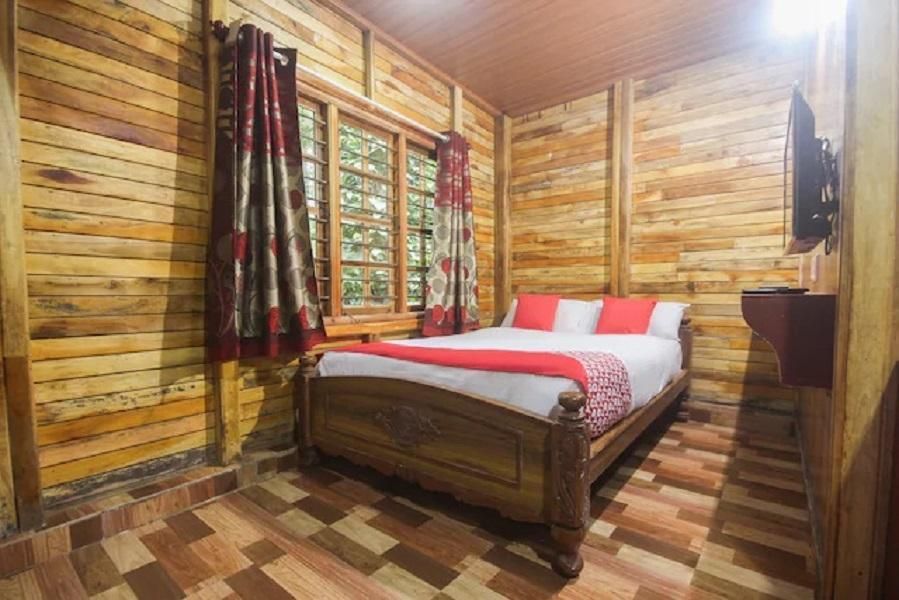 Coorg Coffee Flower Resort - מדיקרי - חדר שינה