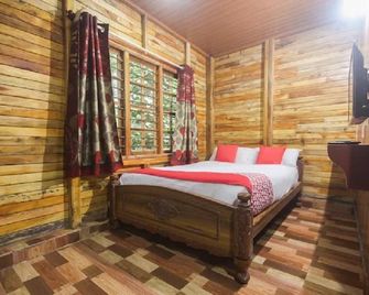 Coorg Coffee Flower Resort - מדיקרי - חדר שינה