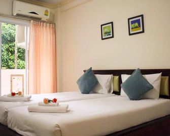 Chumphontravelodge Hotel - Chumphon - Bedroom