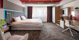 Park Inn by Radisson Bucharest Hotel and Residence - Bucharest - Phòng ngủ