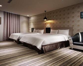 أو هاوس هوتل - مدينة كاوهسيونغ - غرفة نوم