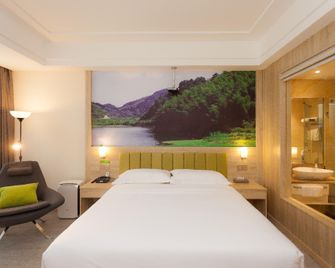 ibis Styles Nantong Shimao Plaza Hotel - נאנטונג - חדר שינה