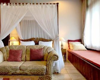 Rumah Stroberi Organic Farm & Family Lodge - Lembang - Slaapkamer