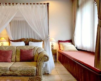 Rumah Stroberi Organic Farm & Family Lodge - Lembang - Slaapkamer