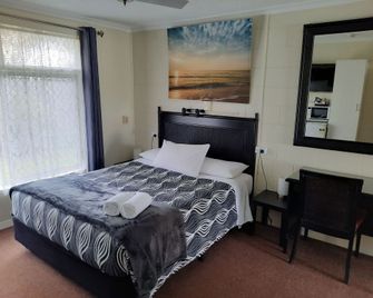 Flying Spur Motel - טוומבה - חדר שינה