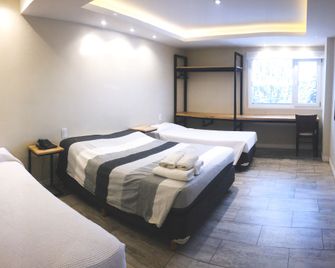 Hotel Monaco - Ushuaia - Bedroom