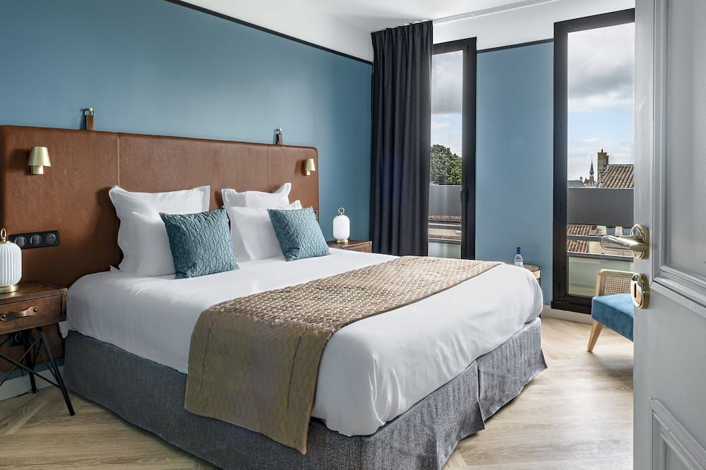 ميزون ديه أمباسادورز - لاروشيل - غرفة نوم