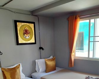 North Star Guest House - Chiang Mai - Schlafzimmer