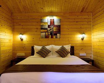 Tranquility Cottage Resorts - Baga - Makuuhuone