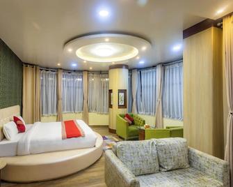 The Sr Hotel - Jogīkuti - Habitación