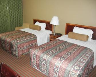 The Surrey Inn - Caldwell - Bedroom
