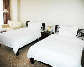 Garden Hotel - Datong - Schlafzimmer