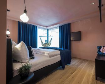 Sport Hotel Passo Carezza - Carezza al Lago - Schlafzimmer