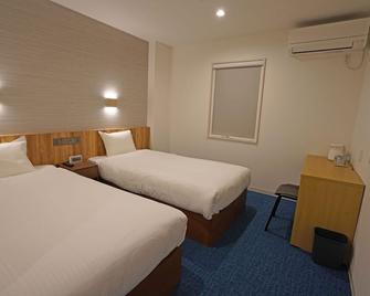 Kanku In Hotel - Tajiri - Ložnice