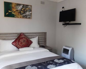 Driftwood Boutique Bed And Breakfast - Lobatse - Habitación