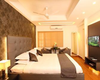 Hotel Luciya Palace - Thrissur - Habitación