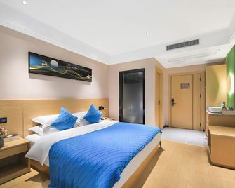Elegant Encounter Luxury Hotel (Golden Eagle Municipal Government Branch) - Yancheng - Bedroom