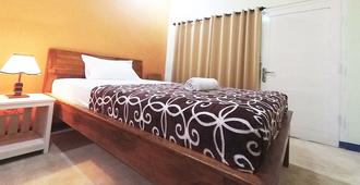 The Warong Nusa Penida - Hostel - Denpasar - Bedroom