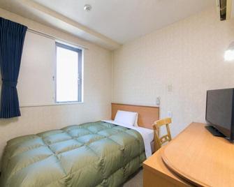 Hotel Econo Yokkaichi - Yokkaichi - Bedroom