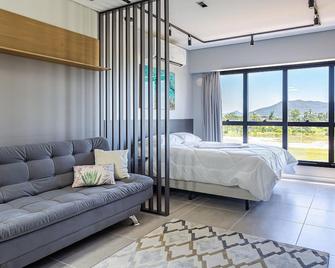 Studios aconchegantes em Floripa - OKA - Florianopolis - Chambre