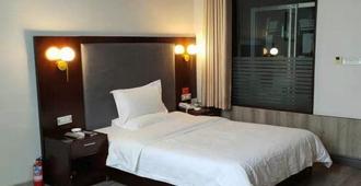 Taihe Xuanwu Hotel - Shiyan - Schlafzimmer