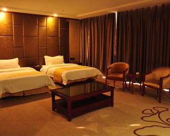 Boyin Hotel - يونتشنغ - غرفة نوم