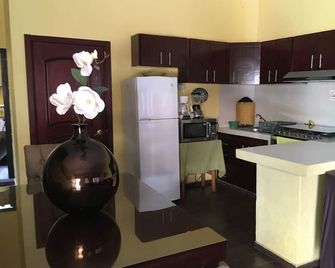 5 minutes to the Downtown! Family-sized condo - Tequila - Cocina