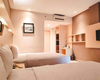 Emerald Hotel Pangandaran - Pangandaran - Schlafzimmer