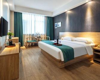 I Lai Hotel - Datong - Schlafzimmer