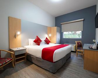 Inani Hotel Gallagher - Midrand - Schlafzimmer