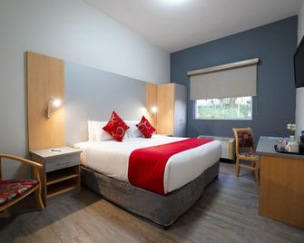 The Gallagher Hotel - Midrand - Slaapkamer