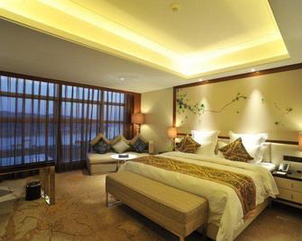 Guolong Hotel - Wuzhou - Bedroom