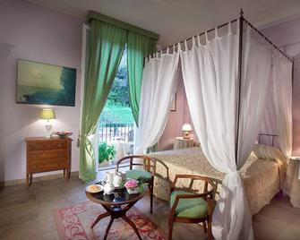 بد آند بريكفاست مونتي أوليفيتو - فلورنس - غرفة نوم