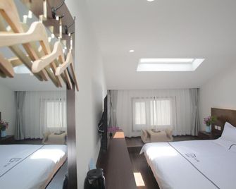 Xiao Yuan Alley Courtyard Hotel - בייג'ין - חדר שינה
