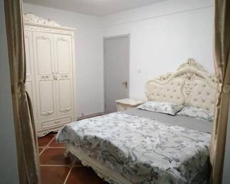 Weihai Haina Holiday Apartment - Weihai - Bedroom