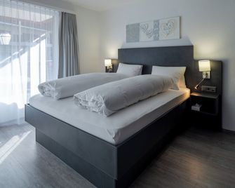 dala Hotel & Apartments - Leukerbad - Sovrum