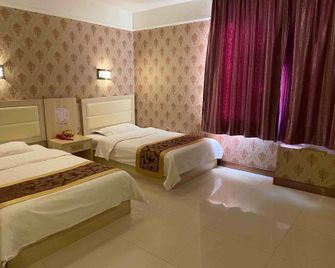 Wolong Hotel - Qiqihar - Habitación