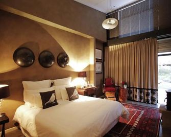 Liedjiesbos Urban Olive Farm - בלואמפונטיין - חדר שינה