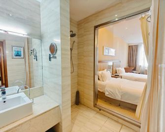 Solar valley micro-e international hotel - Dezhou - Bedroom