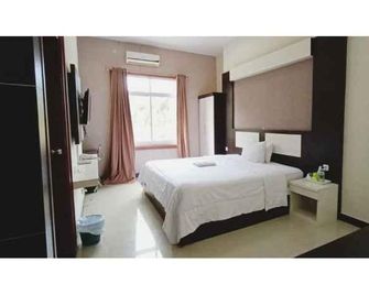Galaxy Inn - Baubau - Habitación