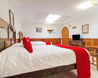 Capital O OYO Hotel Las Nubes Mercado de Dulces y Artesanias Ambar, San Cristobal De Las Casas - סן קריסטובל דה לס קאסאס - חדר שינה