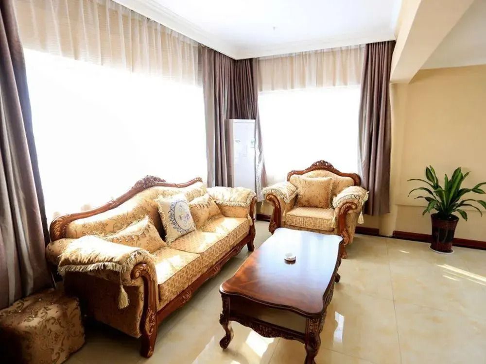 Greentree Inn Shandong Yuncheng Ximen Street Songjiang Kung Fu School Business Hotel - Heze - Вітальня