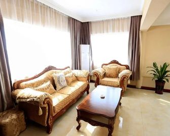 Greentree Inn Shandong Yuncheng Ximen Street Songjiang Kung Fu School Business Hotel - Heze - Вітальня