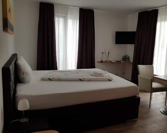 Hotel Ackermann - Riedstadt - Schlafzimmer