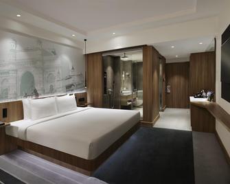 Novotel Mumbai Juhu Beach - Mumbai - Schlafzimmer