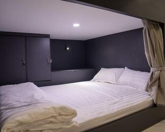 Remedy Hostel - 永珍 - 臥室
