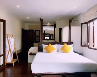Ancient Luangprabang Hotel - Luang Prabang - Bedroom