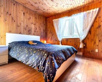 Chalet in a dark sky reserve - Notre-Dame-des-Bois - Habitación