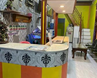 OYO 93308 Lima Saudara Syariah - Painan - Recepción