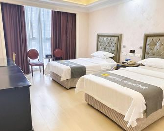 سيكير هوتل - تشونغتشينغ - غرفة نوم